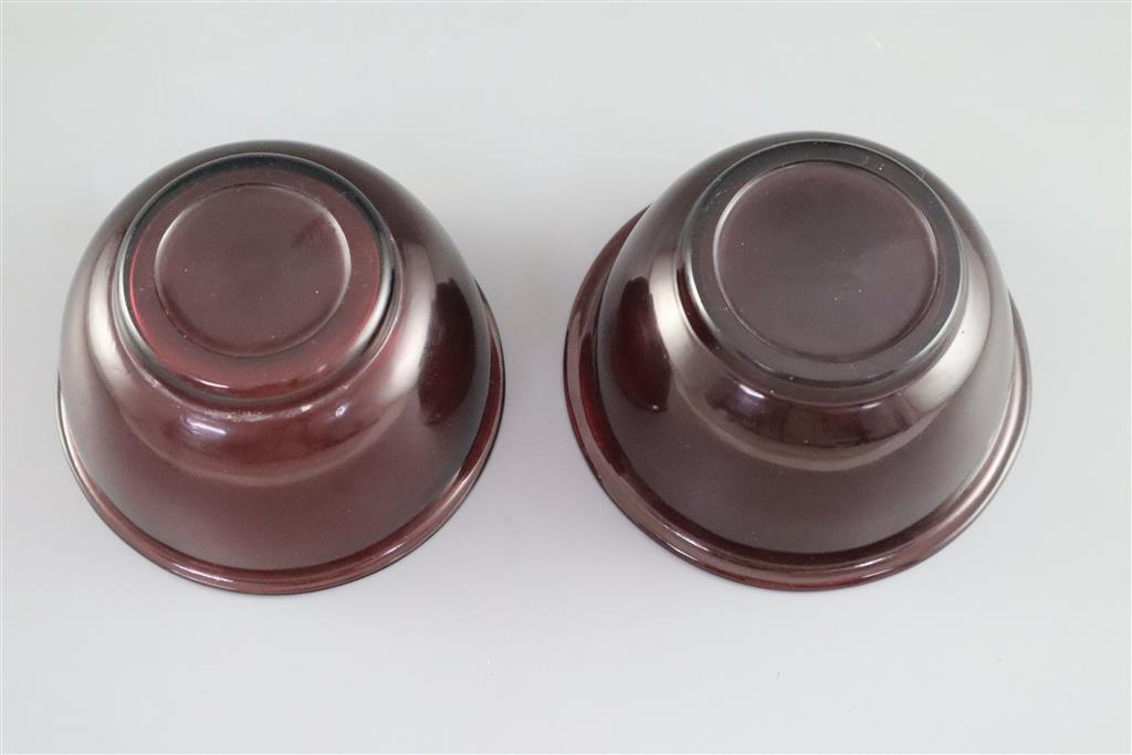 A pair of Chinese Beijing aubergine glass bowls, probably Qing dynasty, 10.5cm diameter